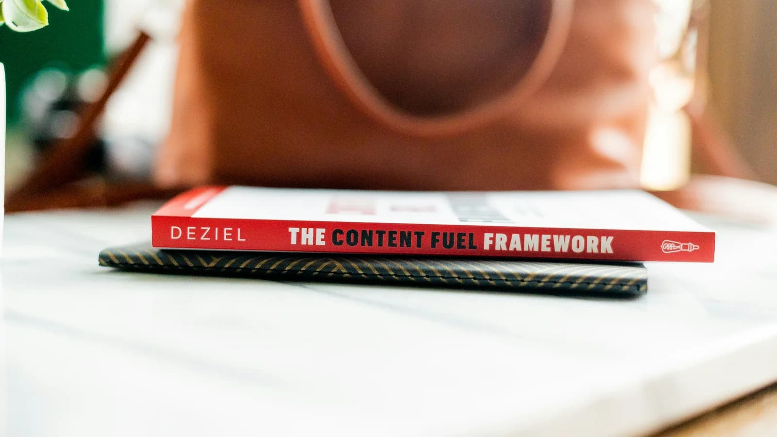 An open textbook resting on a desk